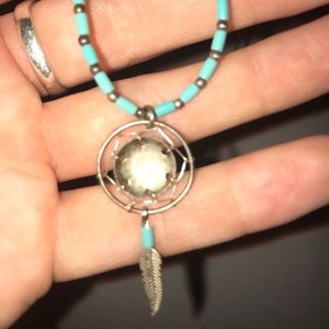 Feathered Charmed Sterling Silver Necklace